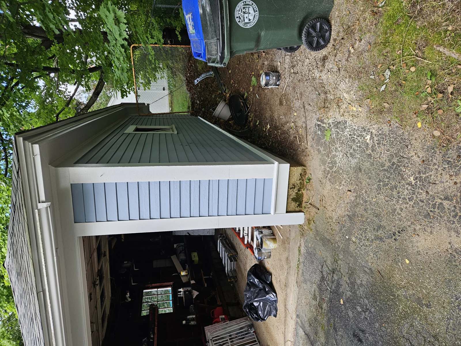 Flawlessly repainted garage exterior—expert color matching ensures seamless siding restoration. T&B Paint Pros delivers professional exterior painting and repairs. tbpaintpros Flagler County Florida experienced painter, specializing in garage restoration and repainting.