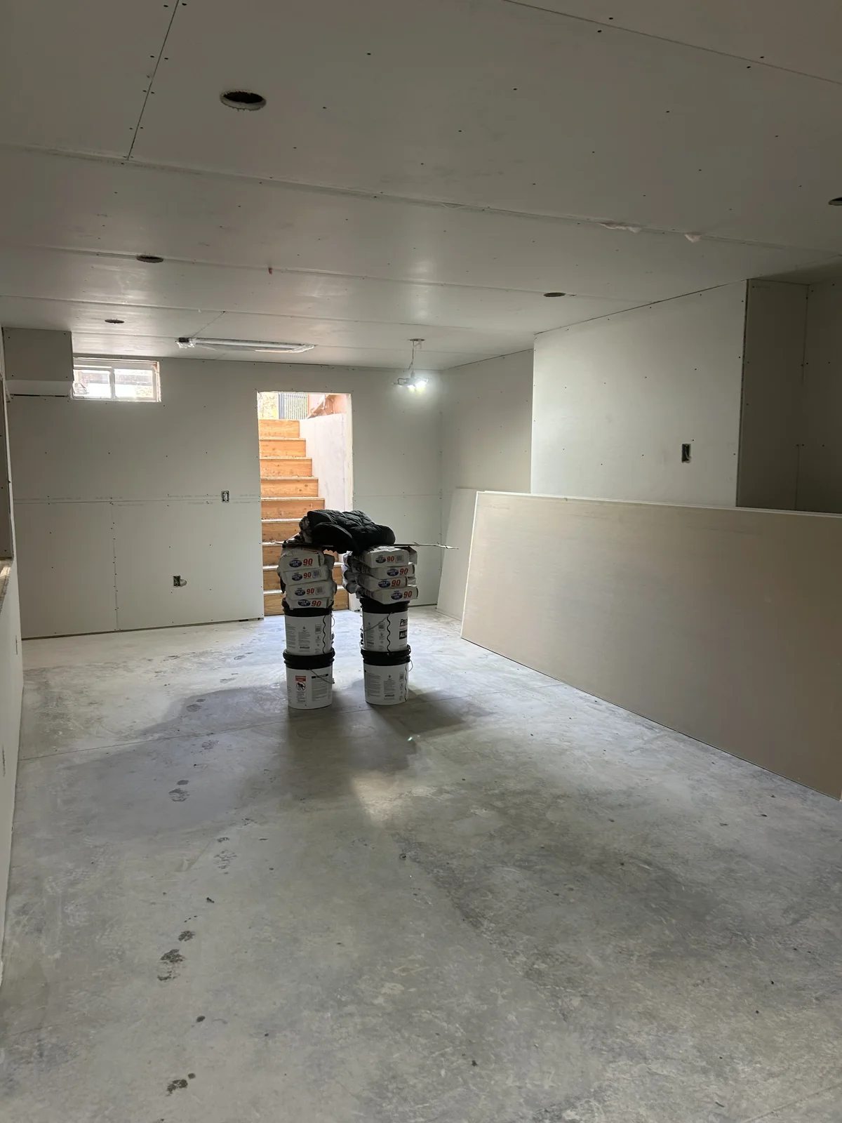 Sheetrock hung in this basement renovation project!